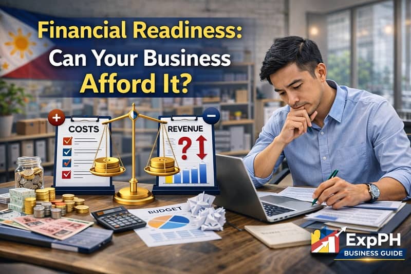 Filipino business owner reviewing financial reports and balancing costs and revenue to assess business affordability in the Philippines