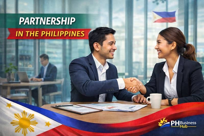 Two Filipino business partners shaking hands in a modern Philippine office representing partnership in the Philippines