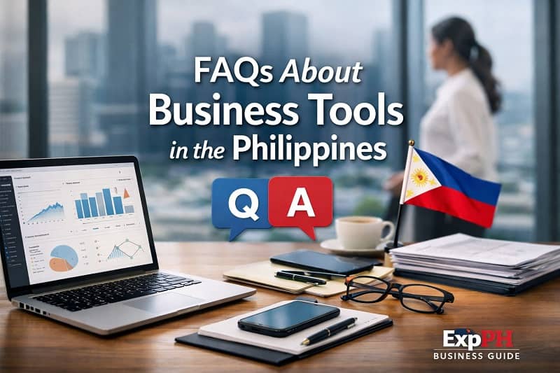 Philippine office workspace with laptop analytics, Q and A icons, and business tools representing frequently asked questions about business tools in the Philippines