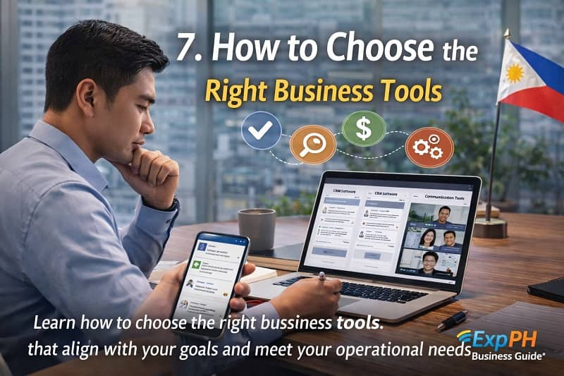 Business owner reviewing different business tools on laptop and smartphone while analyzing options in a modern Philippine office