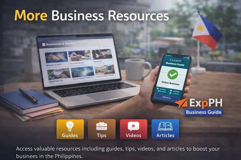 Filipino entrepreneur reviewing business resources on a laptop and documents in a modern Philippine workspace