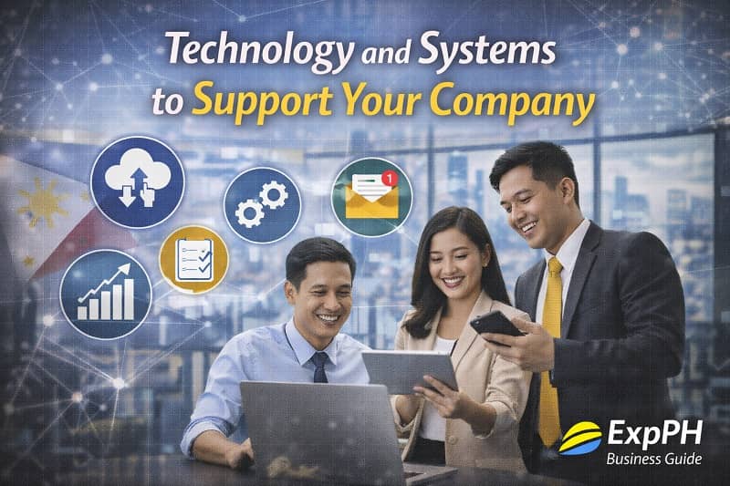 Filipino professionals using laptops and digital tools in a modern office, representing business technology and systems in the Philippines